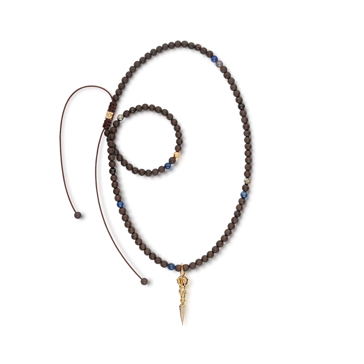 SHAMBALLA Necklace with Skull Phurpa Pendant in 18K yellow gold with white diamonds, blue sapphires, and brown sapphires, by Shamballa Jewels